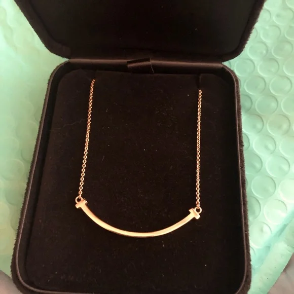 Tiffany Co, Tiffany T 14K Gold Smile Used ones are selling for  $1050